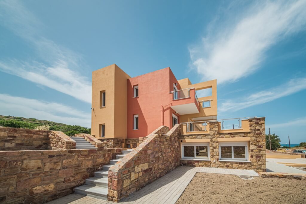 Lina Luxe Apartments building exterior in Chios Greece with modern architecture and sea view